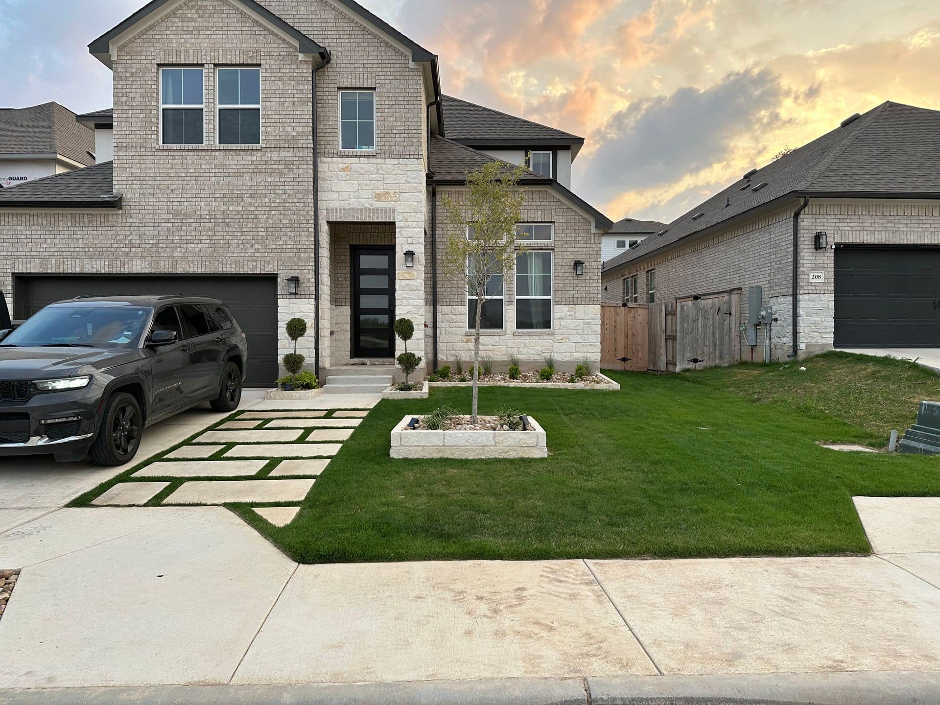 Lush Austin, TX lawn showcasing seasonal landscaping changes and professional maintenance.
